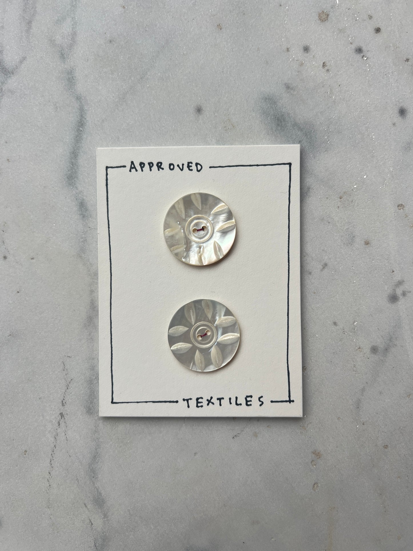 carved mother of pearl buttons