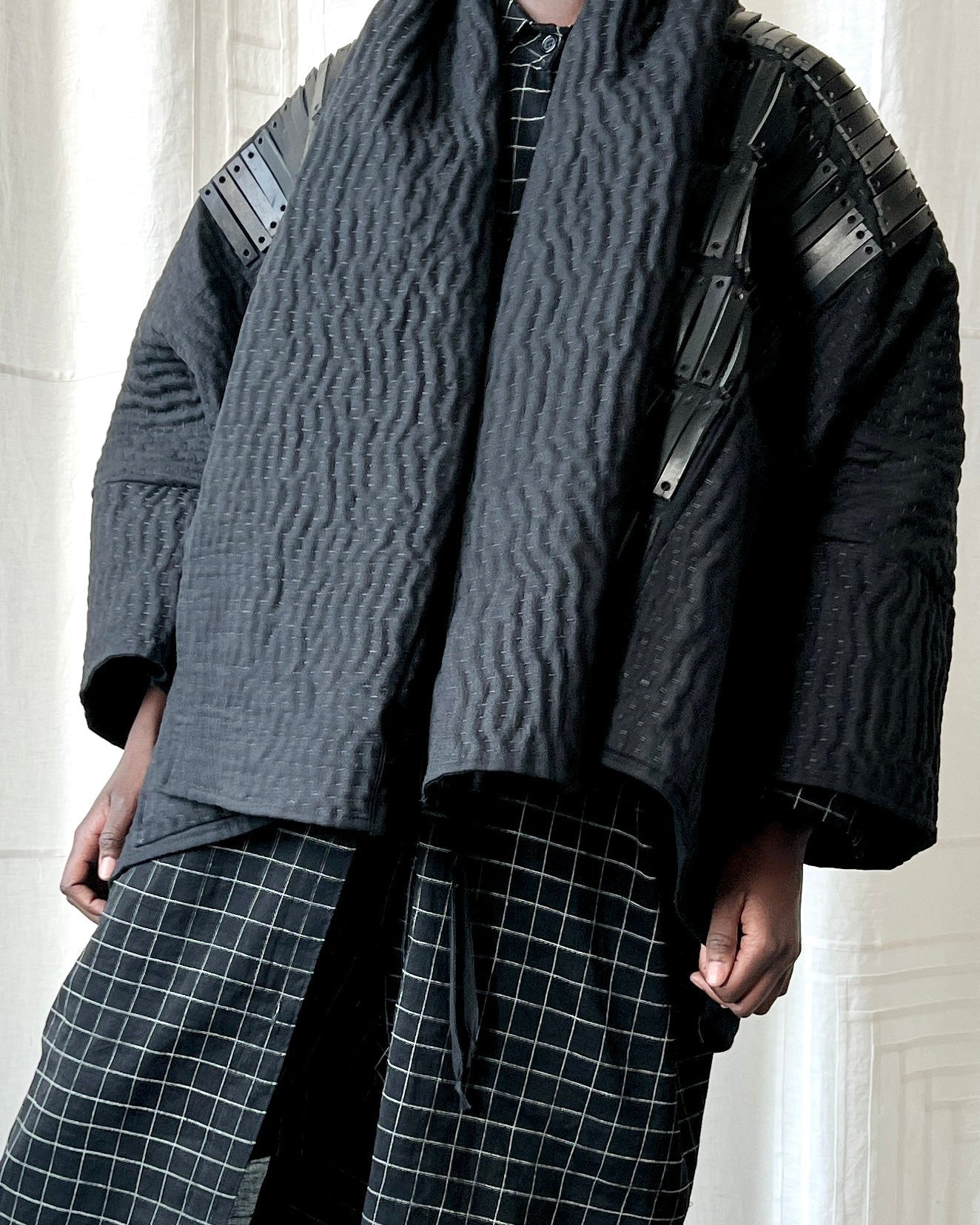 black quilted linen and leather jacket