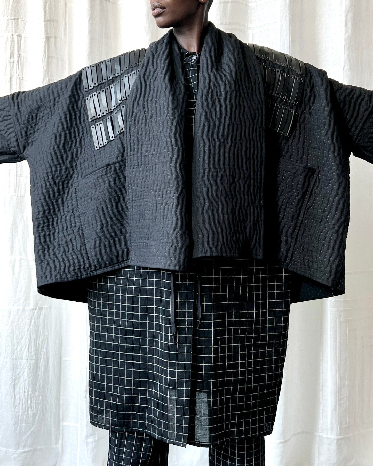 black quilted linen and leather jacket