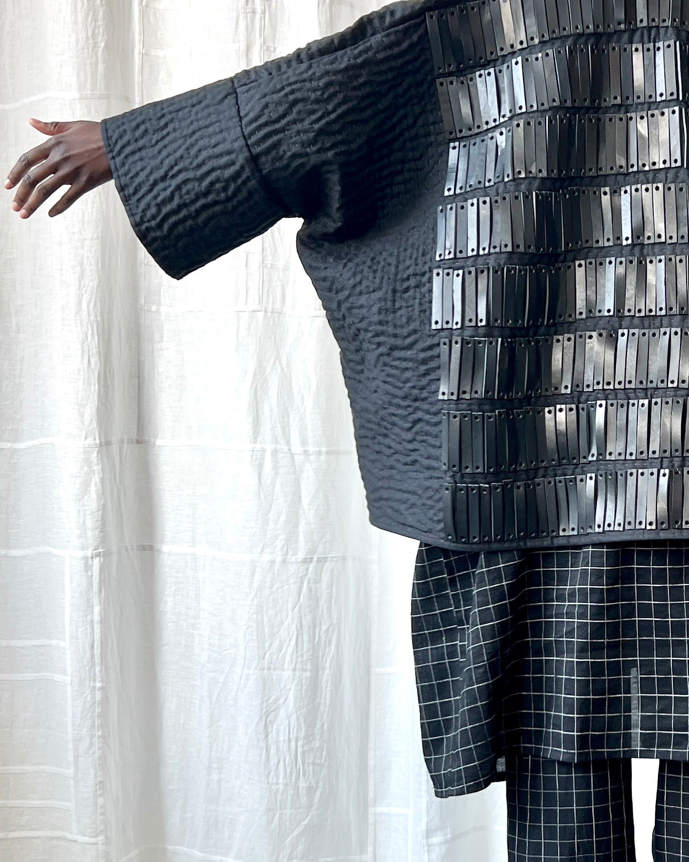 black quilted linen and leather jacket