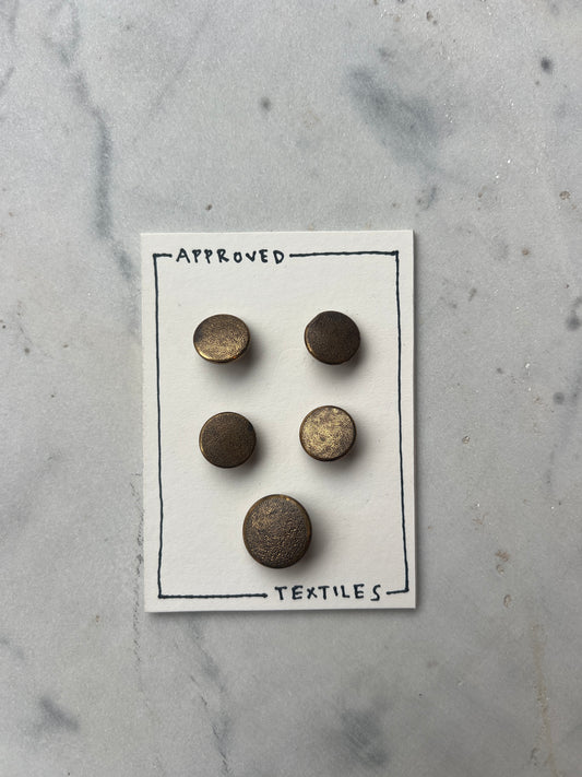 textured brass buttons