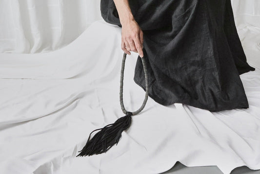 black leather sequins with deerskin tassel